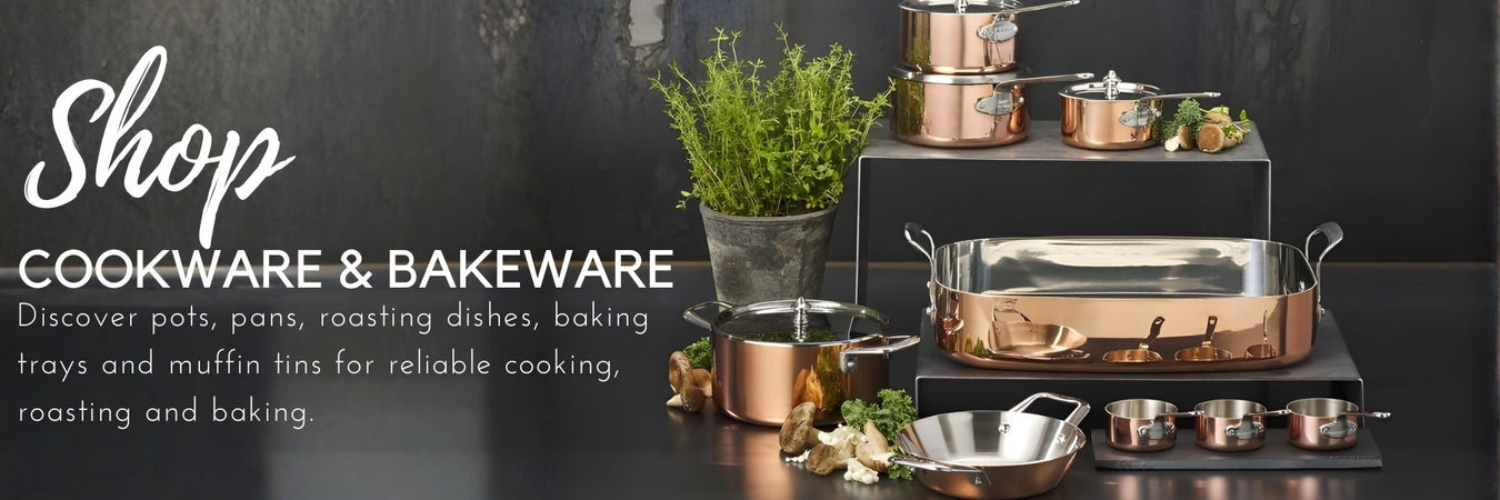 Stovetop pots and oven-baked dishes arranged in a modern kitchen