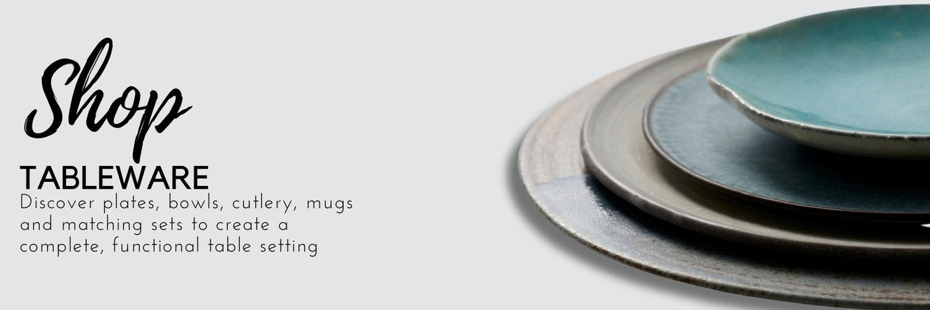 Table set with matching plates, bowls and cutlery for a meal