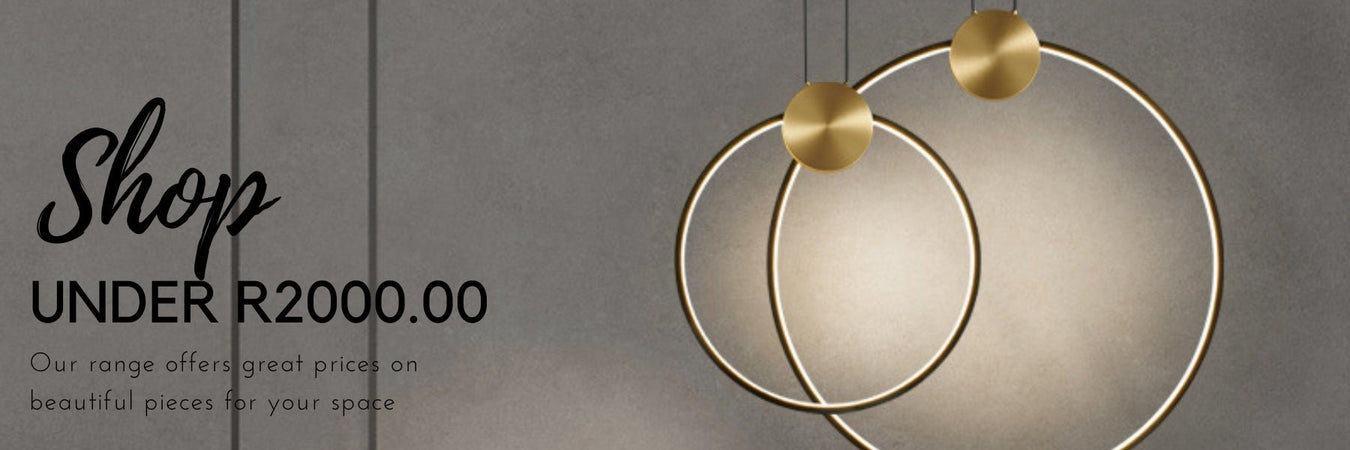 Chandelier and floor lamp priced under R2000 in a styled living room - Lighting.co.za