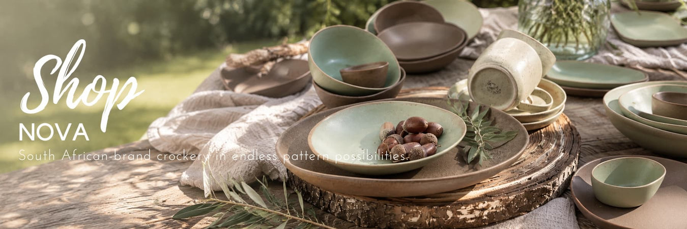 NOVA stoneware crockery in earthy green and brown tones, styled outdoors with natural textures and layered table settings. Versatile tableware inspired by modern South African living.