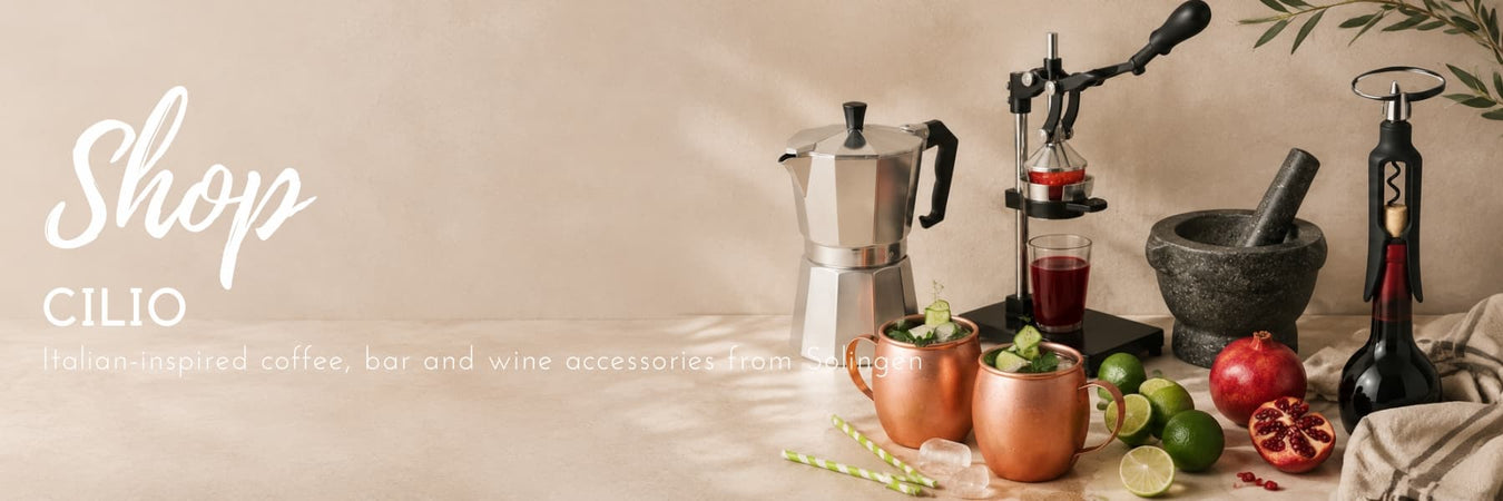 Cilio coffee, bar and wine accessories styled with a moka pot, citrus press, mortar and pestle, and wine opener. Italian-inspired kitchen essentials for entertaining and everyday rituals. Lighting.co.za
