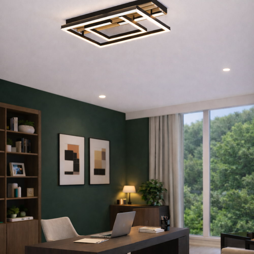 Modern office space with a ceiling light fixture, desk, and large window.