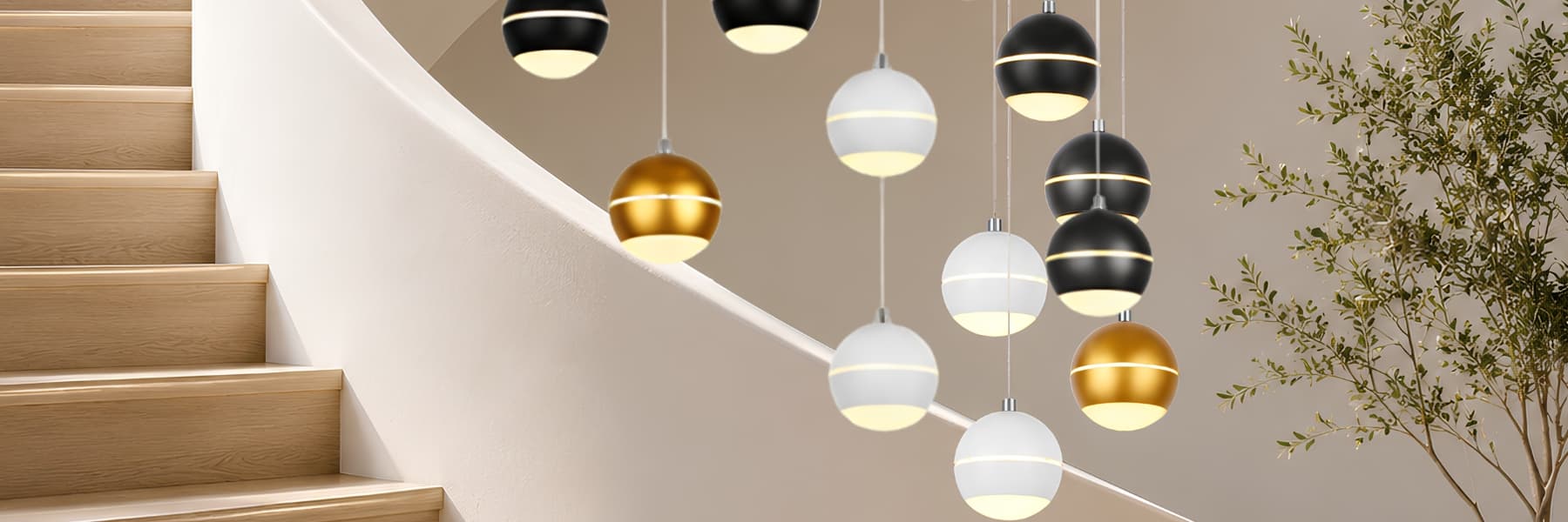 Modern pendant light fixtures in black, white, and gold hanging beside a curved staircase in a minimalist interior setting. Pendant Light Buying Guide - Lighting.co.za