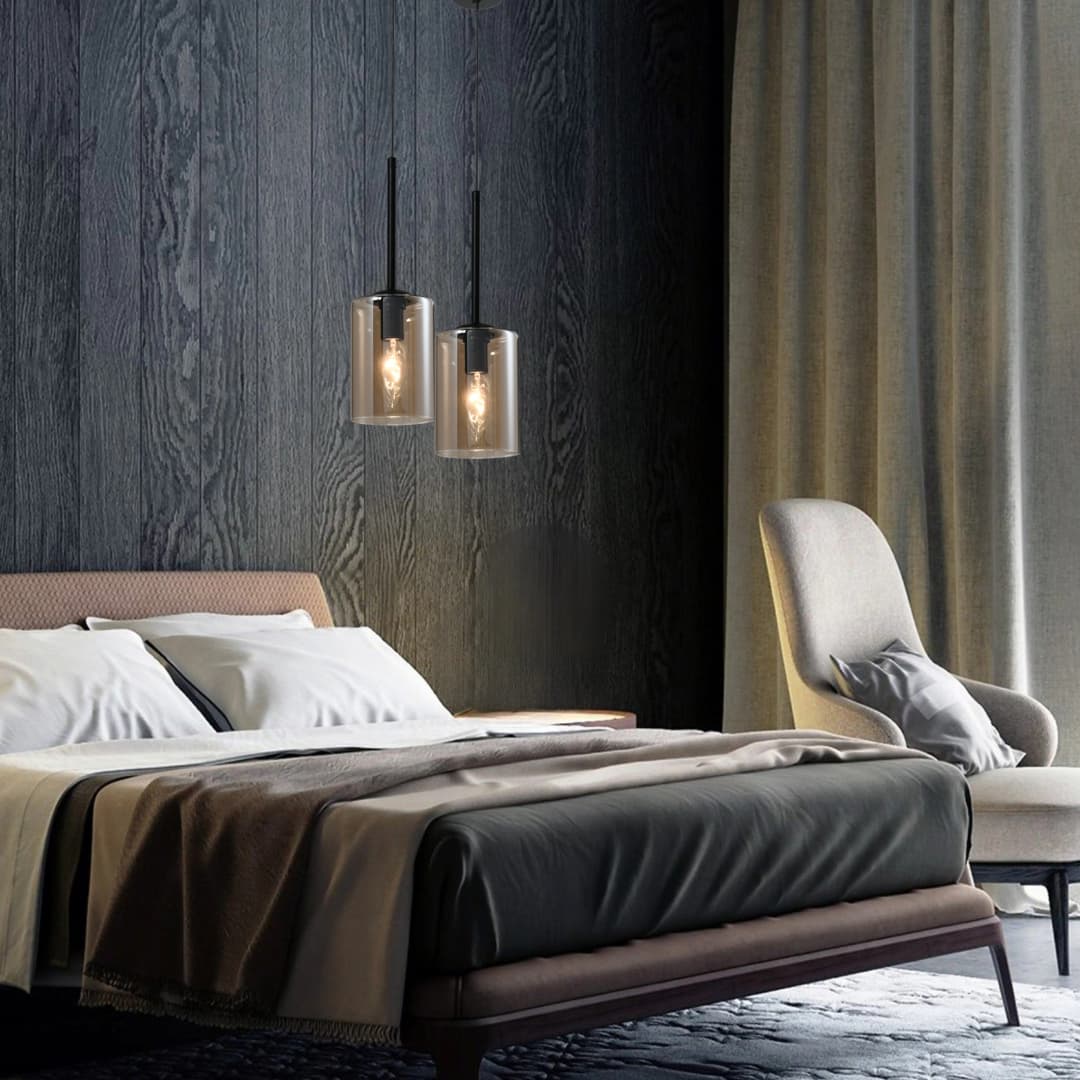 Modern bedroom with a bed, armchair, and decorative Black and Smoke Glass Small Pendant lights - Lighting.co.za