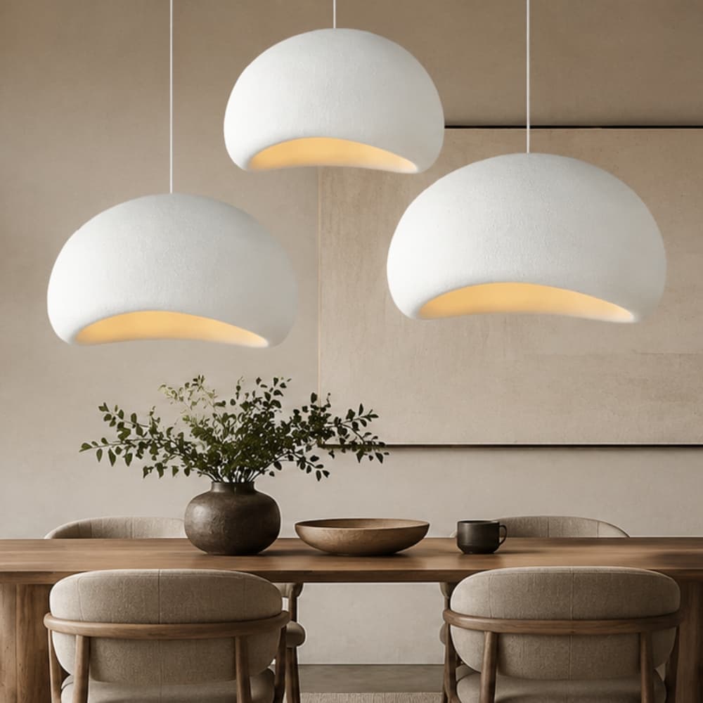White organic pendants in a Japandi Dining room with wooden table and chairs - Lighting.co.za