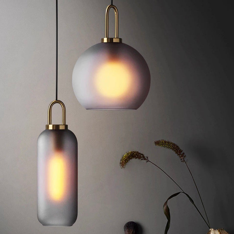 Ebbe Round Smoke Grey Glass and Antique Brass Pendant Light - Lighting.co.za